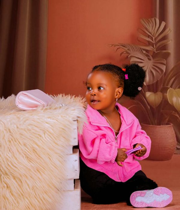 Woman feeling energetic and vibrant in a bright room.